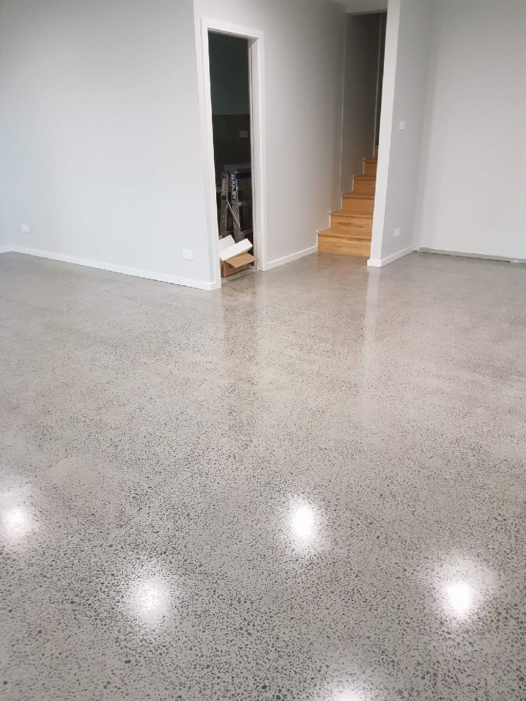 FB_IMG_1524435552823 Commercial grind and seal concrete flooring inside a busy Wollongong retail shop with a slip-resistant matte finish.
