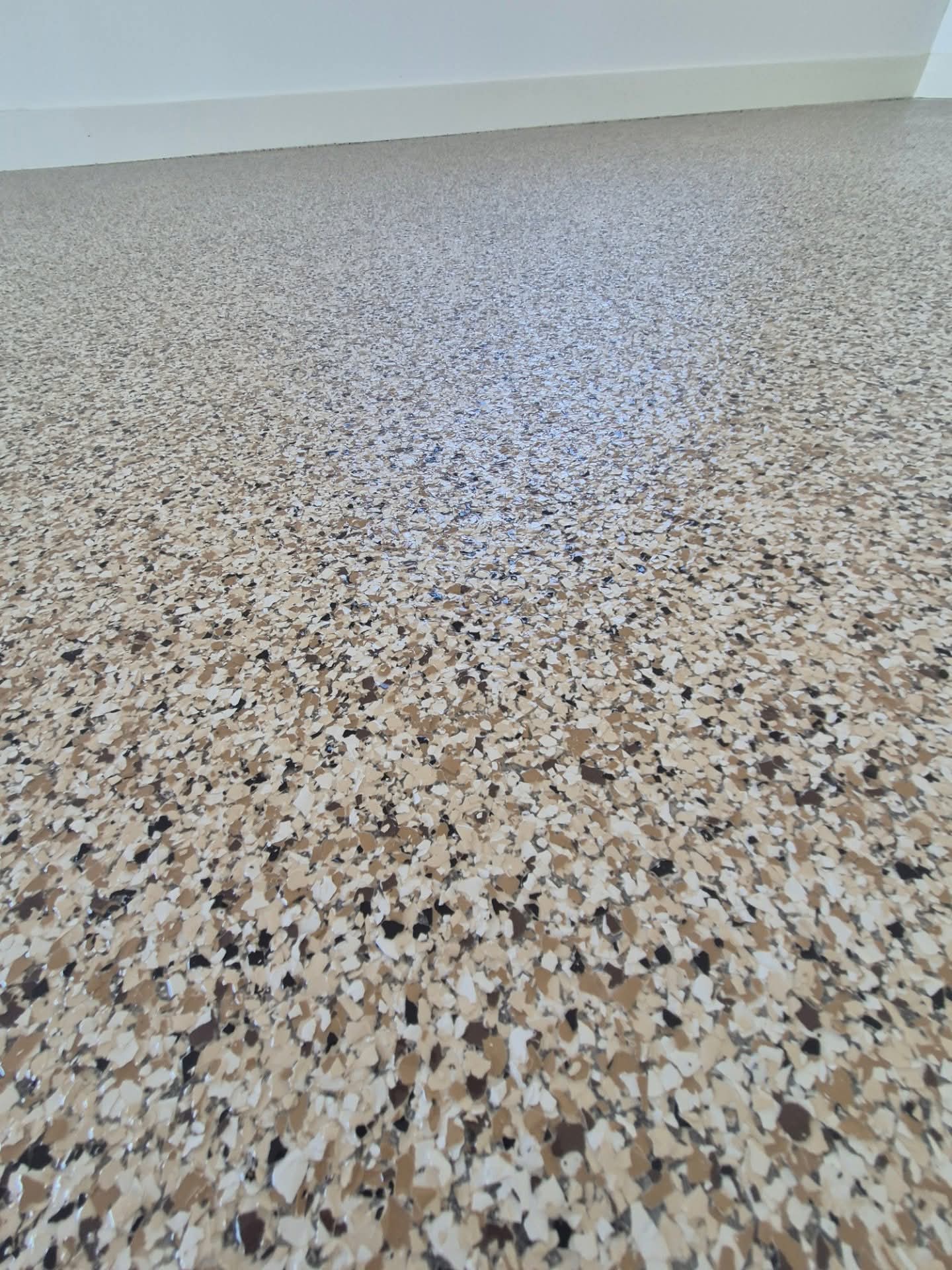 150m2 industrial shed floor with green & white flake epoxy finish in Ulladulla by ProSand."