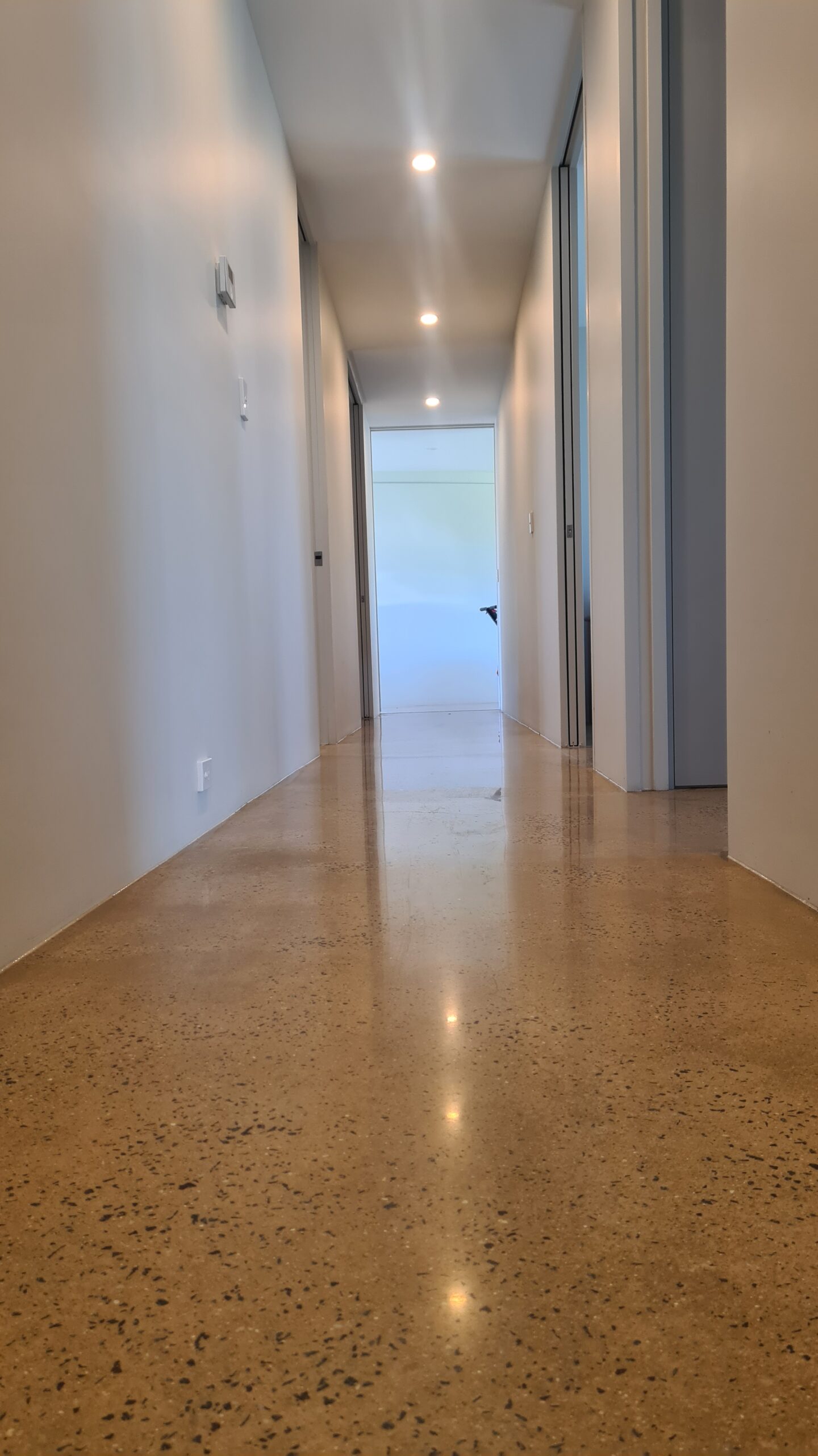 Premium 800 grit mechanically polished concrete indoor floor featuring a smooth satin finish in the Southern Highlands.
