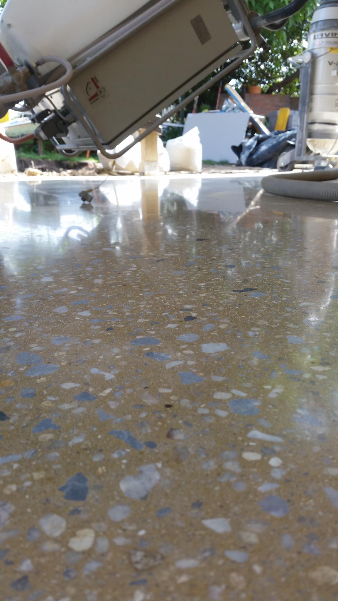 Matte satin 400 grit mechanically polished concrete indoor floor for a coastal residential property in Culburra Beach.