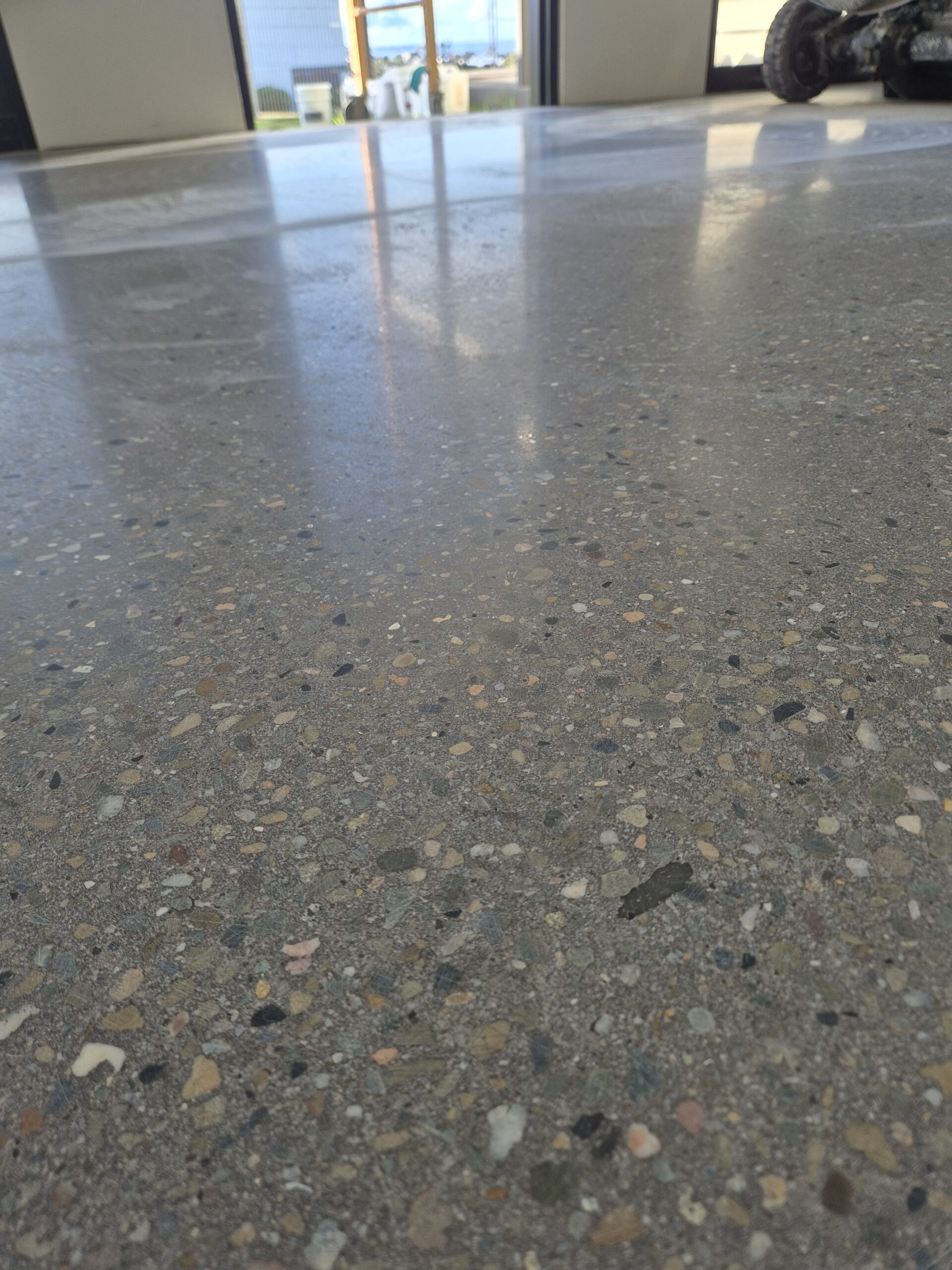 ProSand commercial concrete polishing machinery preparing a garage floor slab in Nowra.