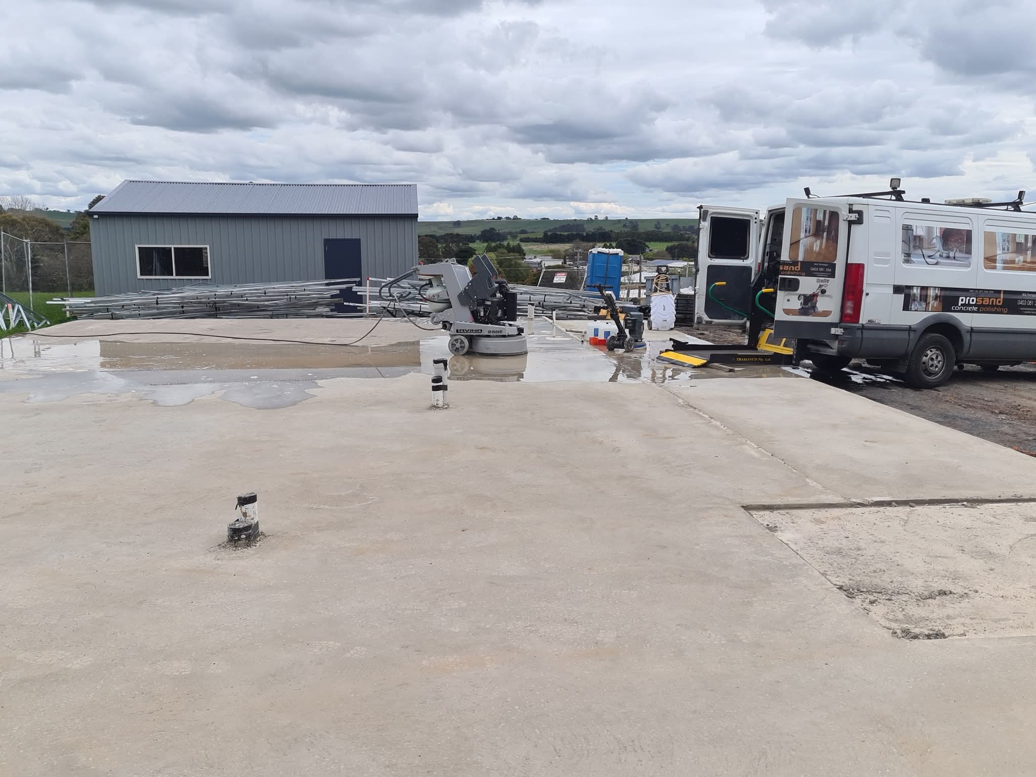 ProSand heavy-duty planetary floor grinder levelling and prepping a concrete slab in Wollongong.